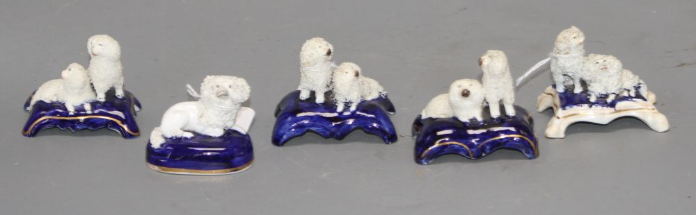 Five Staffordshire porcelain toy groups of poodles, c. 1840-50, the majority by Dudson, H. 4.2 - 5.2cm